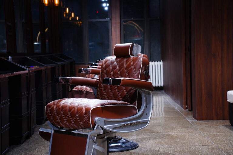 Calm grooming room with leather chairs at The Upper Seat, facials and face massage NYC